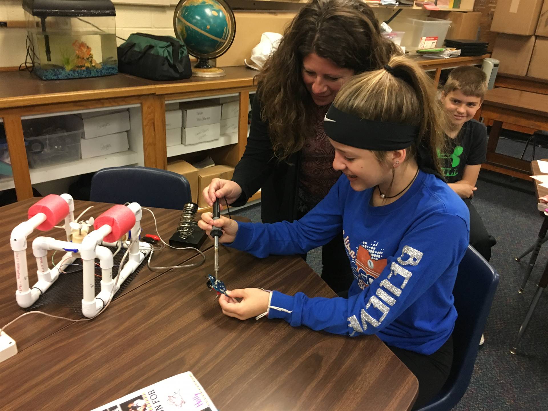 7th grade students building and testing their SeaPerch. 